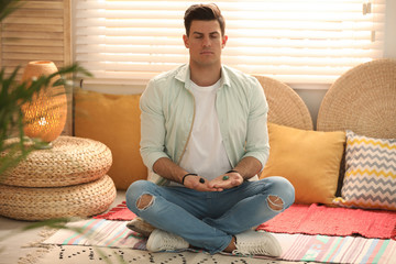 Man during self-healing session in therapy room