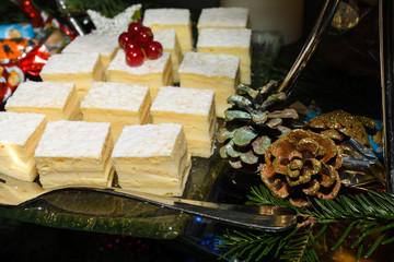 Various desserts in candy bar food buffet during hotel brunch, catering, cake pops, mousse, tarts