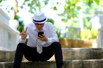 businessman using mobile phone and successful business plan