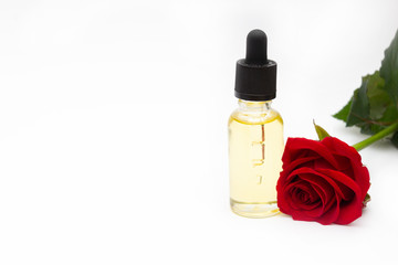 Drop bottle with rose oil. Skin care concept, hydration