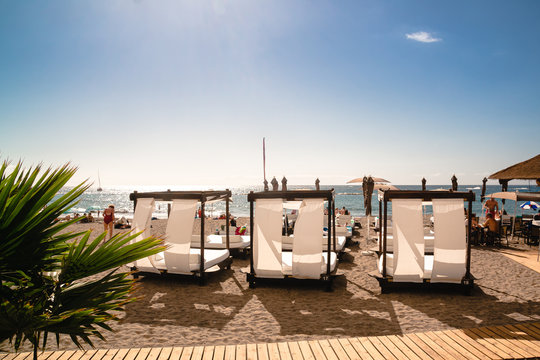 popular Tenerife beach at sunset, resort vacation concept