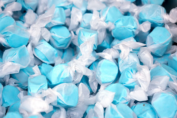 Blue candy in clear white wrappers