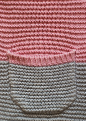 pocket on a knitted textured surface