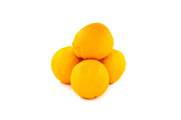 Four oranges isolated on white background. Creative healthy food concept. Flat lay.