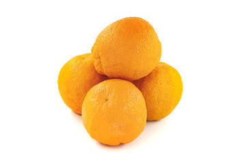 Four oranges isolated on white background. Creative healthy food concept. Flat lay.