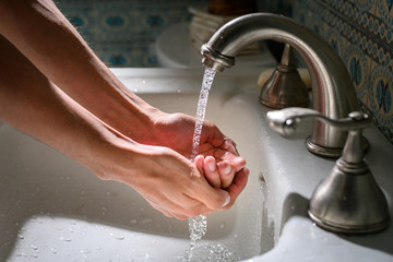 washing hands with water
