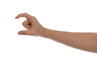 Man holding something against white background, closeup of hand