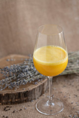 yellow smoothie with lavender bouquet