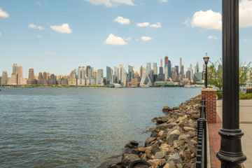 New York City Skyline with view from New Jersey. NYC hudson river skyline. - 348352755