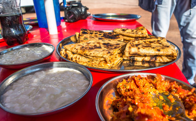 Tasty potato Parathas with curd and tea, Indian Breakfast
