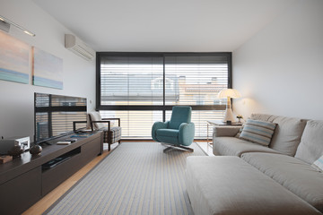 room with blue sofa