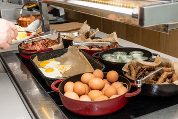 Selection of self service english continental breakfast buffet display, catering or brunch