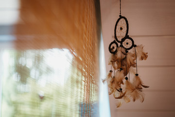 photo of a dream catcher in the room