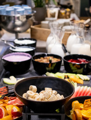 Selection of self service catering continental breakfast buffet display, catering or brunch table
