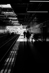 people walking in the subway