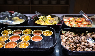 Selection of self service catering continental breakfast buffet display, catering or brunch table