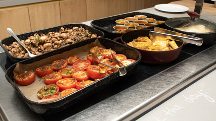 Selection of self service catering continental breakfast buffet display, catering or brunch table