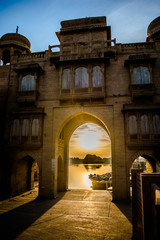 Fototapeta premium Gadsisar Sagar Lake in Jaisalmer Rajasthan, Sunrise at Gadsisar Sagar Lake 