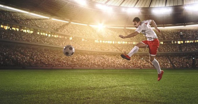 Soccer player shows great skills during the game on a professional soccer stadium on a sunny day. Stadium and crowd are made in 3d and animated.