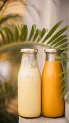 Two bottle - juice and turmeric latte