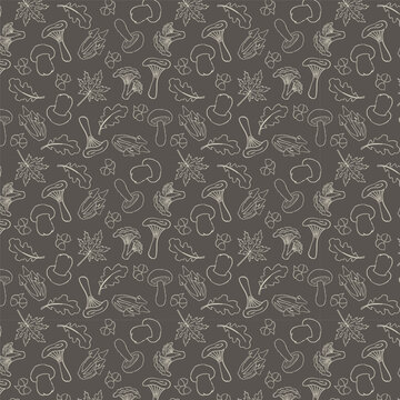 Vector seamless pattern with mushrooms and autumn/fall leaves. White on black hand drawn wallpaper