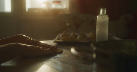 Baker prepares the cake using various ingredients