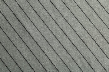 Texture of grey striped fabric as background, closeup