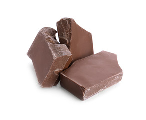 Pieces of milk chocolate isolated on white
