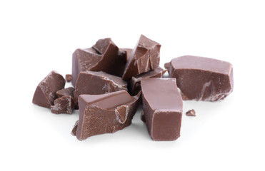 Pieces of milk chocolate isolated on white