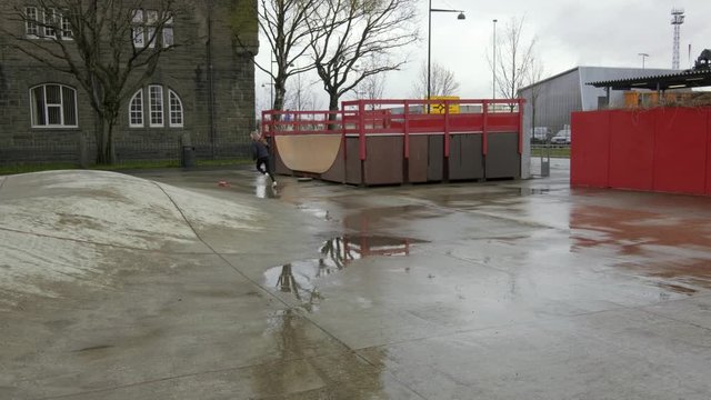 Girl skating in some windy weather