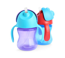 Colorful plastic baby bottles isolated on white