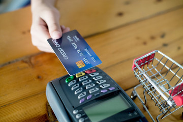 Payment for goods via the automatic credit card system Through wireless magnetic waves called...