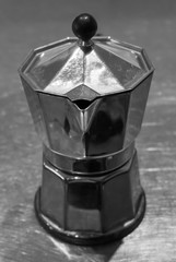 Coffee maker on the kitchen bench in black and white
