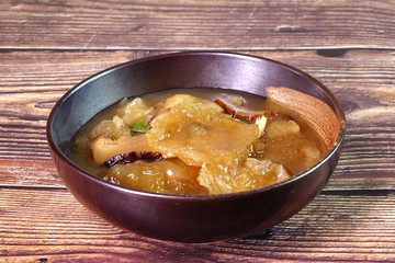 Braised Fish Maw in Red Gravy, famous Hakka cuisine in China, Hong Kong, Taiwan, Thailand. In Chinese food culture, fish maw is a type of food that promotes longevity or wondrous health benefits.