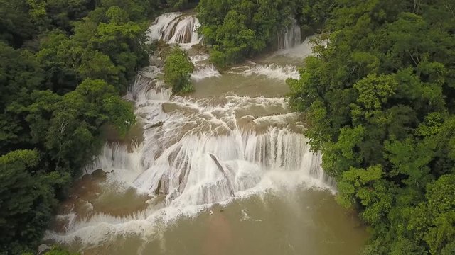 Drone view of a waterfall in the middle of the Chiapas jungle