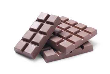 Delicious milk chocolate bars isolated on white