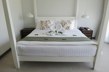 white comfy  bed in luxury hotel for rest in holidays