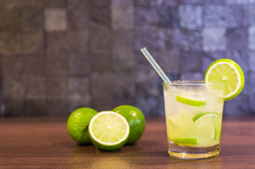 Caipirinha, traditional Brazilian alcoholic drink, typical drink made with sugar, lemon, distilled cane (cachaca) and ice.