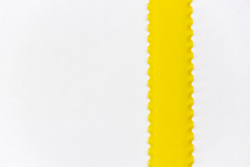 Top view of several strips of raw lasagna on a white background copy space