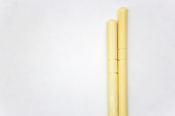Wooden chopsticks, isolated on white background copy space