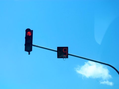 traffic lights blue sky red light