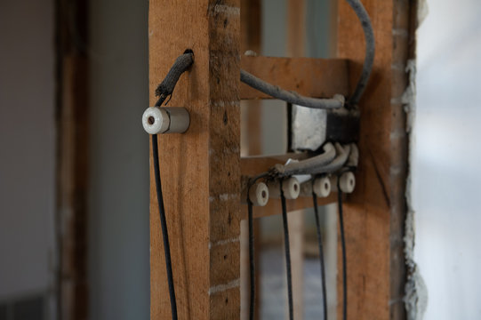 Electrical wires, Knob-and-tube, on a residential renovation site.