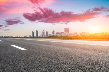 Fototapeta premium Asphalt road and city skyline with buildings in Shanghai,China.