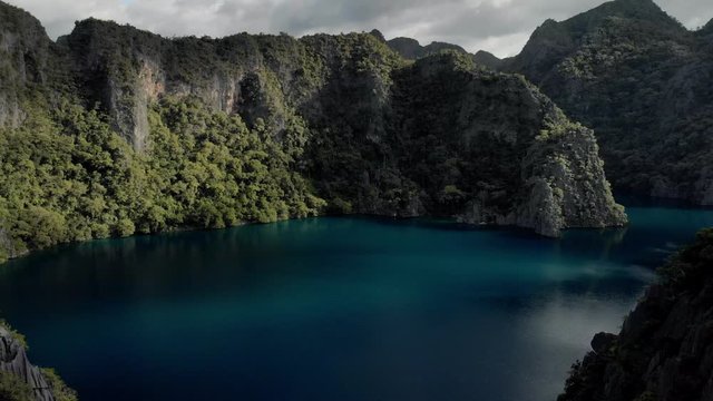 Aerial view of turquoise tropical lagoon with Karst limestone cliffs in Coron Island, Palawan, Philippines. UNESCO World Heritage Tentative List, Baracuda Lake