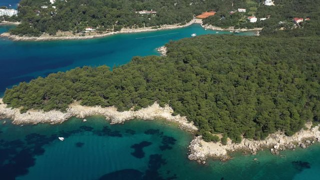 Beautiful Turquoise Cove and Seashore with amazing Beach, Island of Rab in Croatia - Aerial View