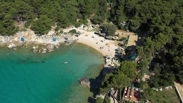 Beautiful FKK Kandarola Beach Rab with Turquoise Sea, Island of Rab in Croatia - Aerial View