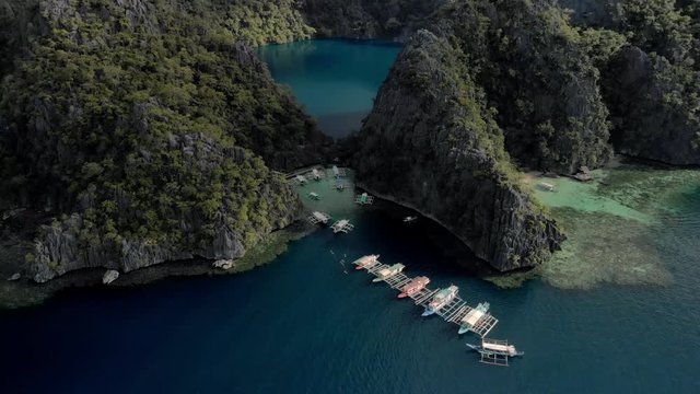 Aerial view of turquoise tropical lagoon with Karst limestone cliffs in Coron Island, Palawan, Philippines. UNESCO World Heritage Tentative List, Baracuda Lake