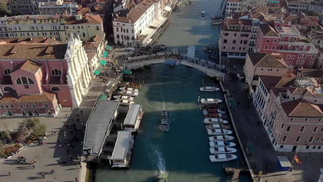 Sunny Venice by drone, above the Canal Grande with old buildings. Drone Video - Aerial View of Venice Italy.