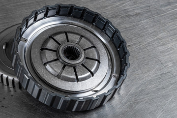 Close-up of an important spare part of a car gearbox. Glossy metal bearing for car.  Metal  autotechnology background