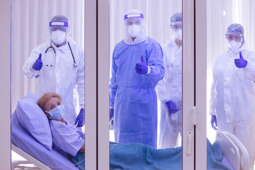 Victory of Doctor & nurse team just recovered patient in hospital. Recovering patient and medical...